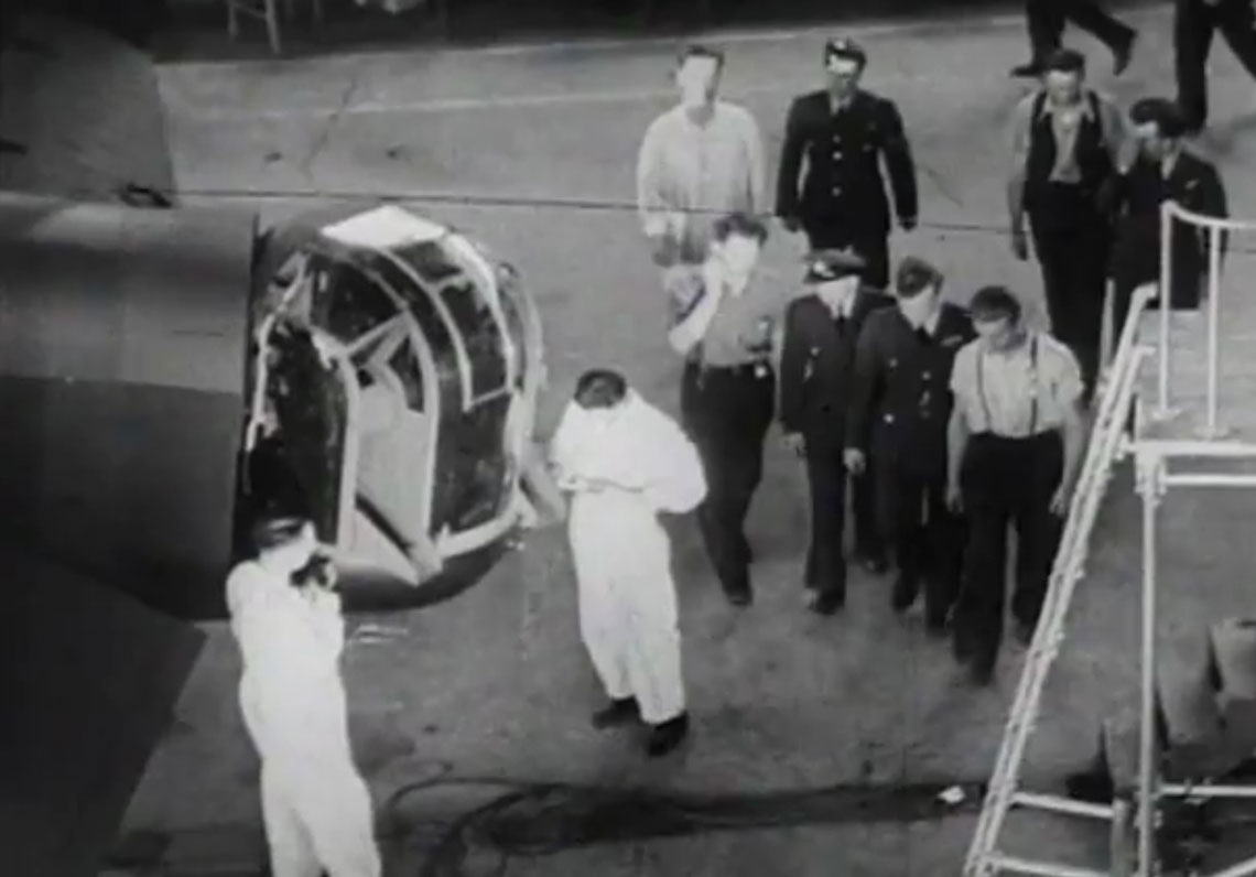 Squadron Leader R.J. Reg Lane and his crew visiting the Victory Aircraft before their departure for England